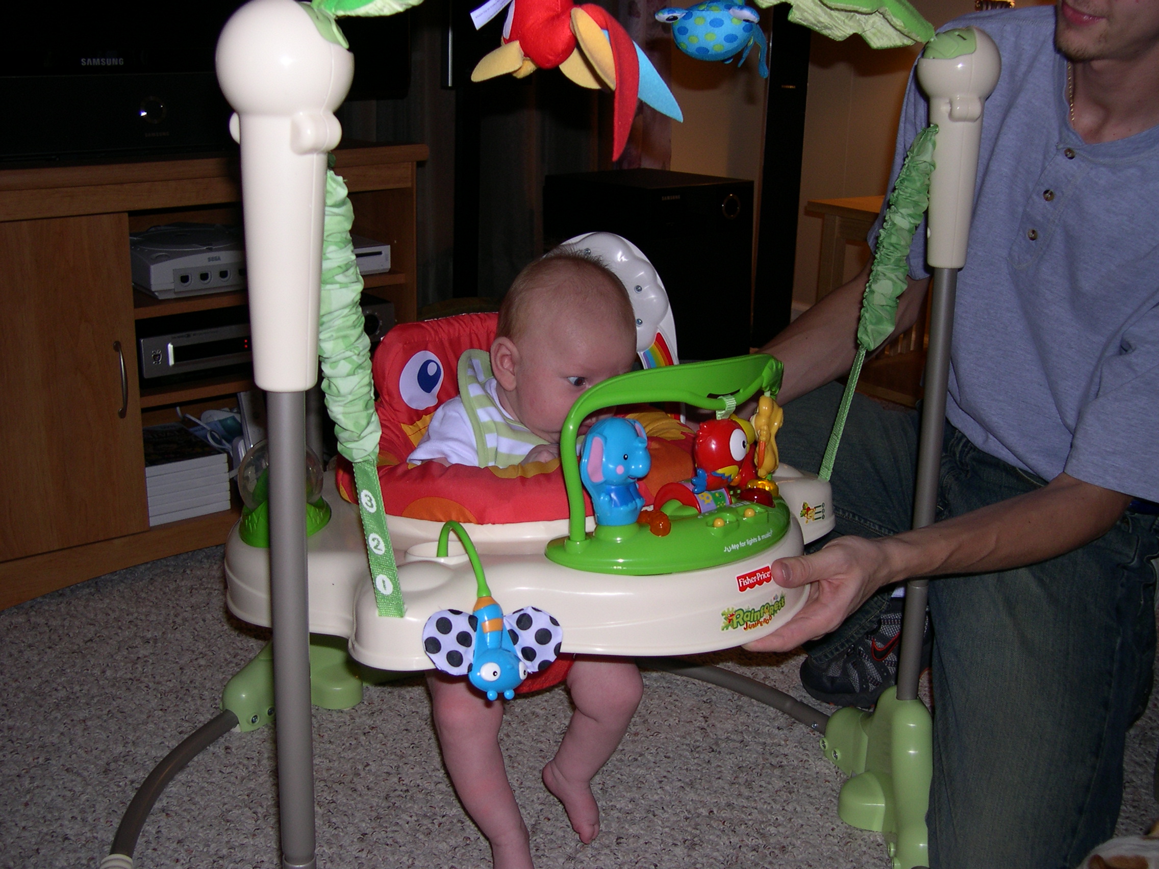 Still too little for the jumperoo...but he likes it anyway!