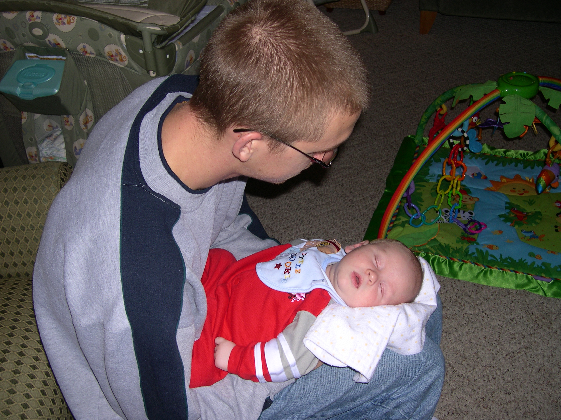 Nicky sleeping on Daddy's lap