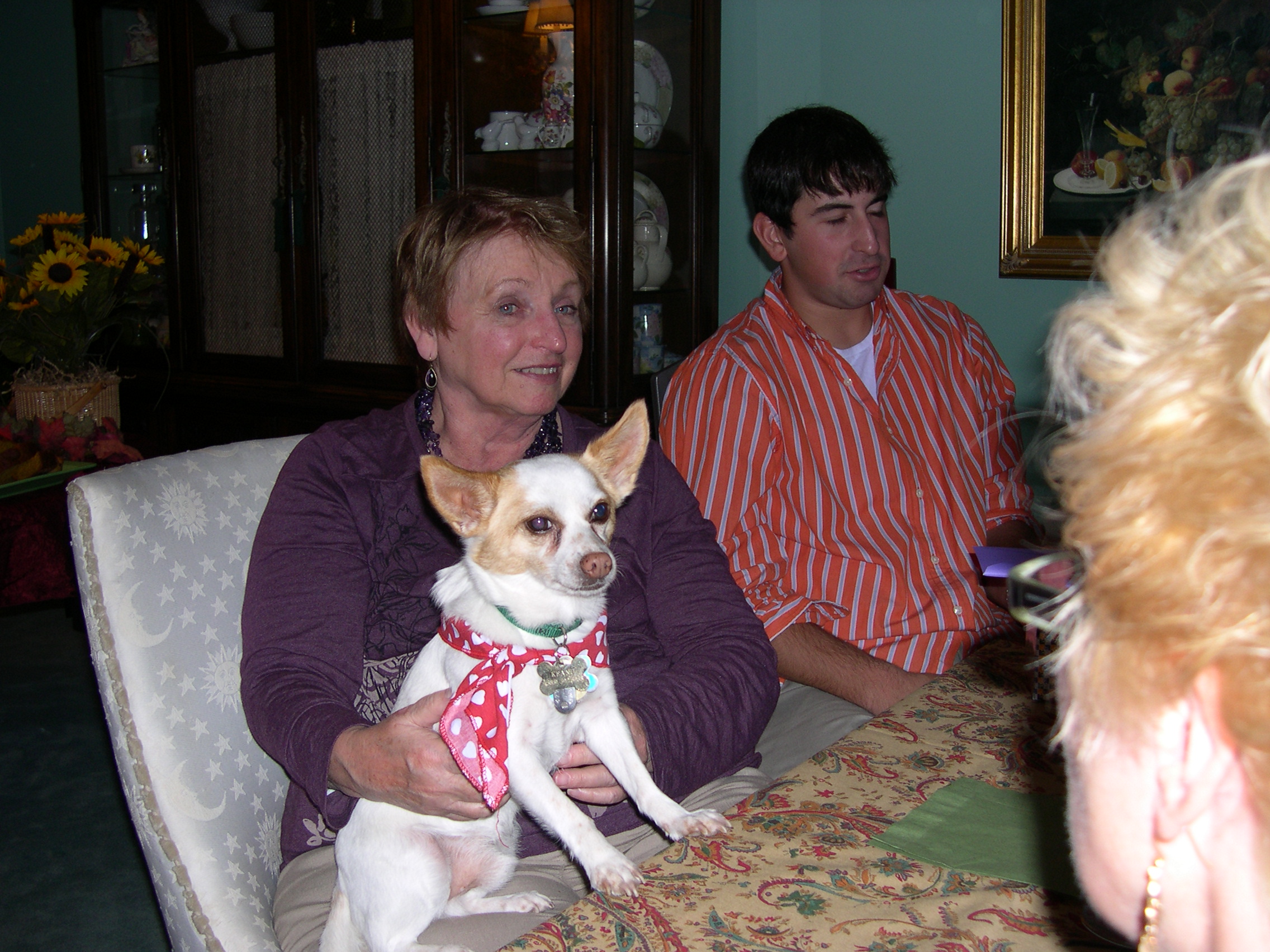 Keanu on Grandma Joan's lap next to