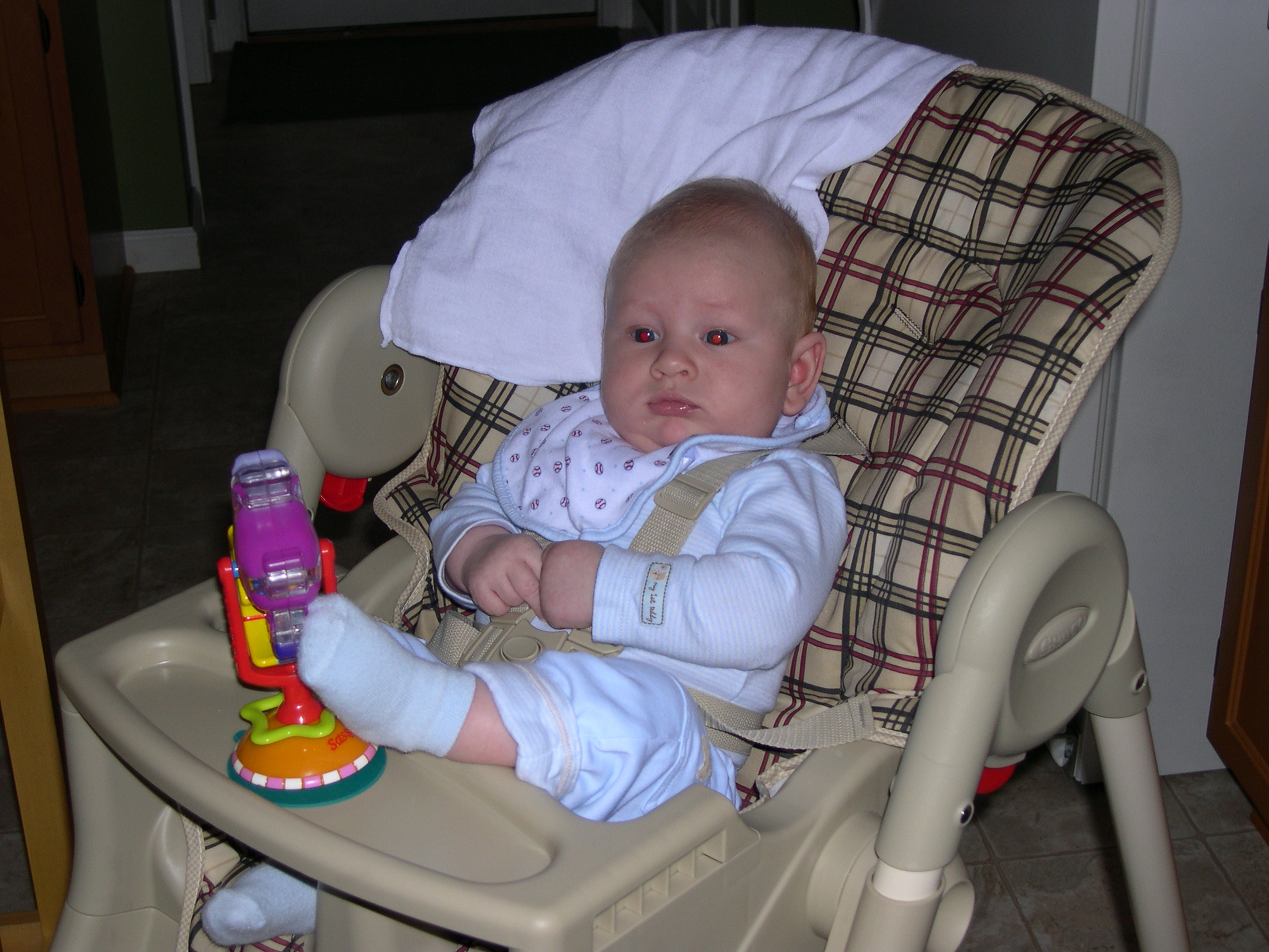 Nicky watching Mommy make dinner