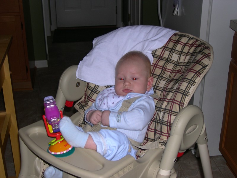 Nicky watching Mommy make dinner