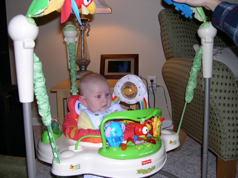 Nicky having fun in his Jumperoo