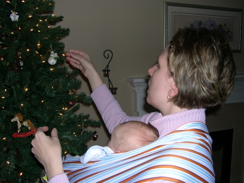 Mommy and Nicky decorate the tree