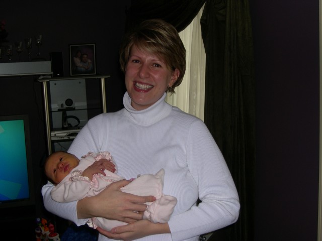 Jen holding Rebecca's new baby!