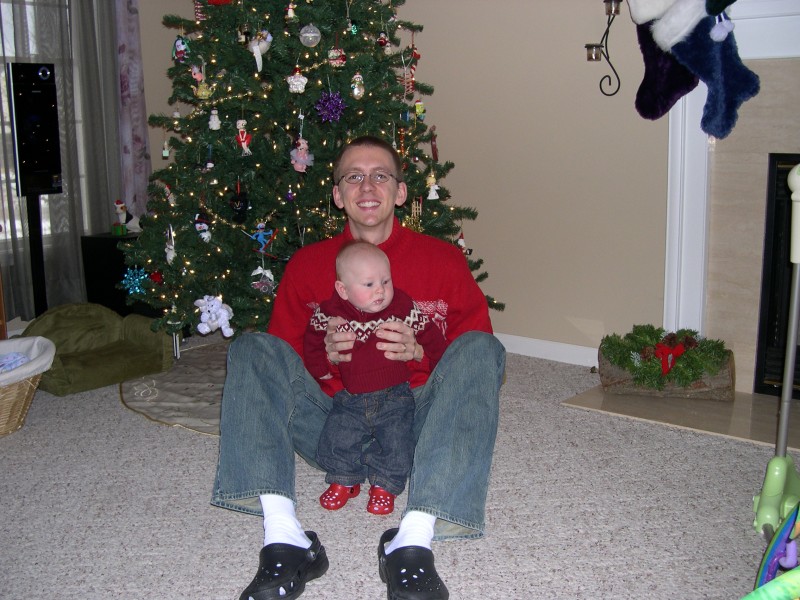 Daddy and Nicky in front of the Christmas tree