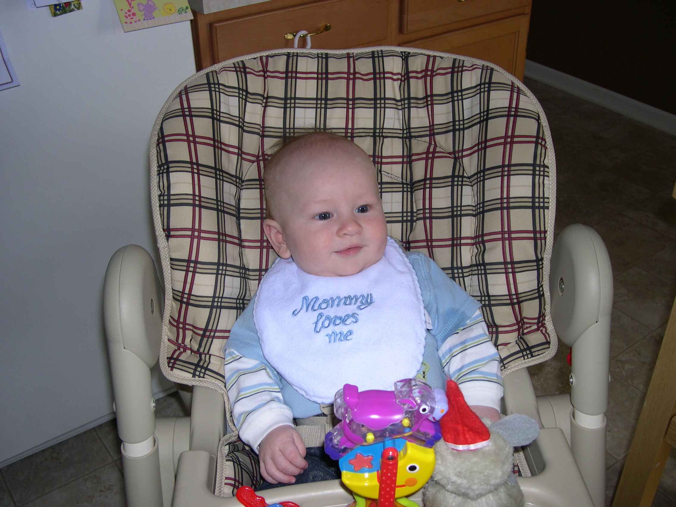 Nicky likes his high chair