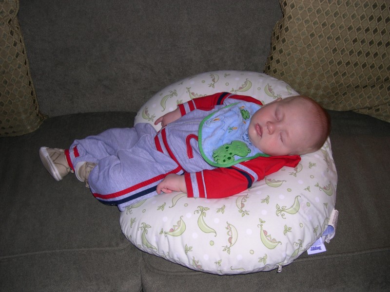 Nicky sleeping in the Boppy