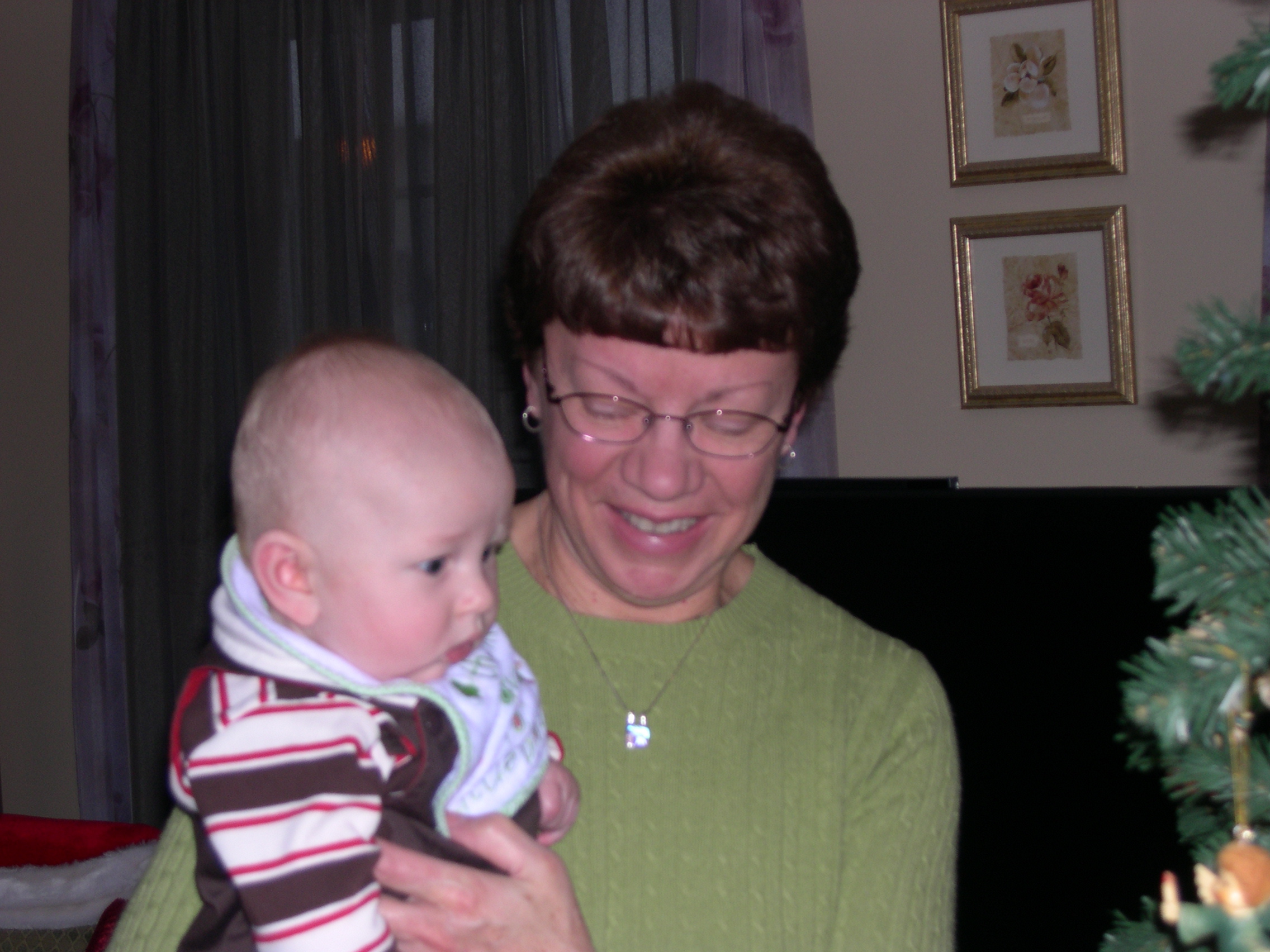 Aunt Carolyn and Nicky looking at the Christmas tree