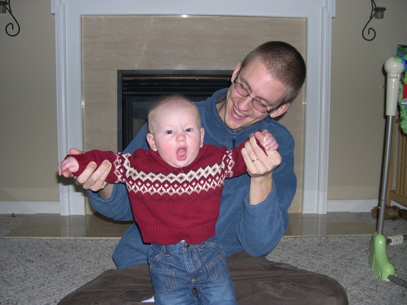 Nicky standing with Daddy