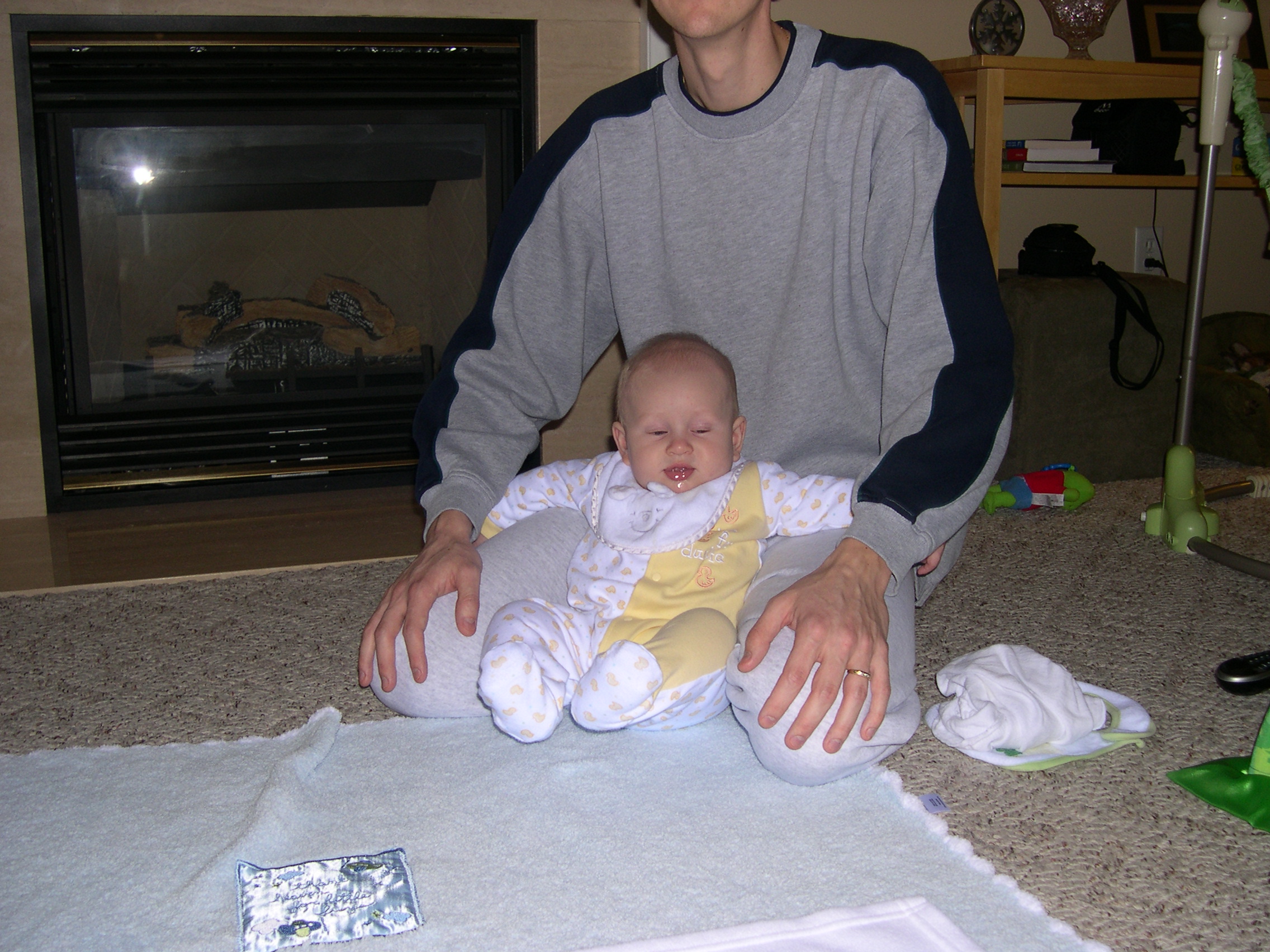 Nicky lounging on Daddy's lap