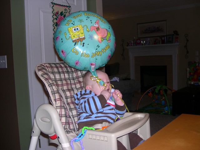 Nicky likes Mommy's birthday balloon