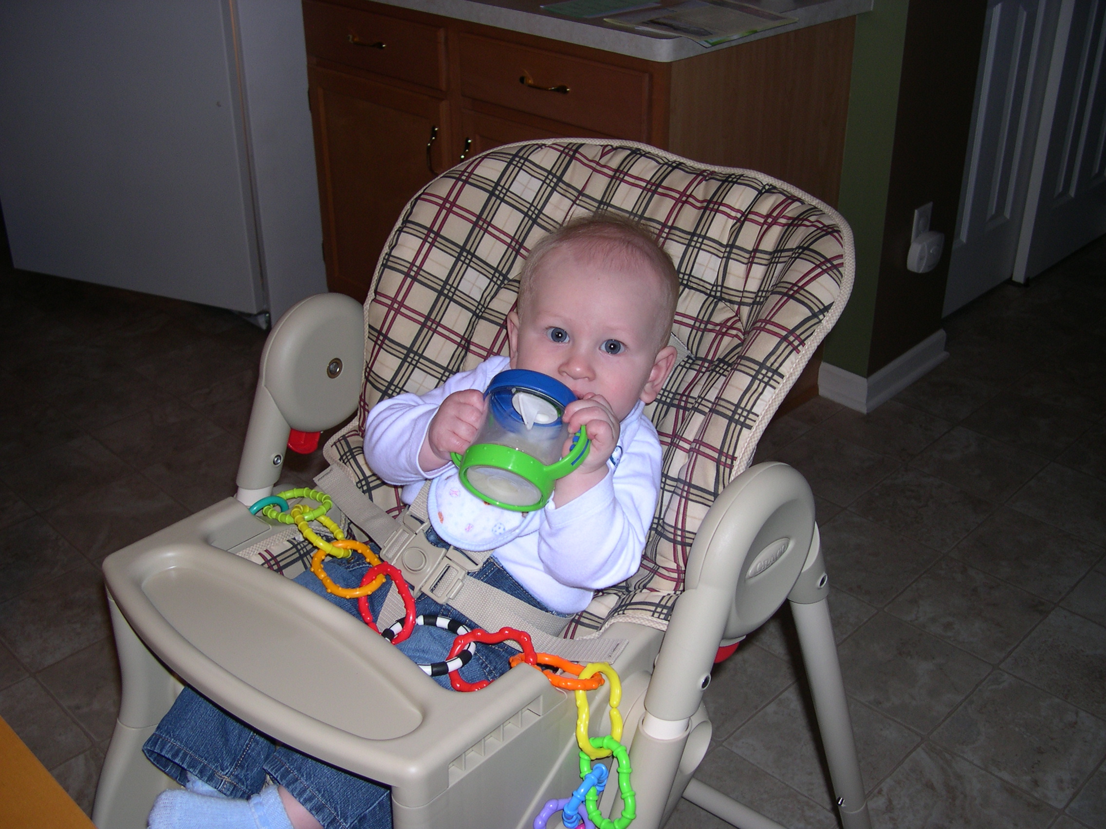 Nicky with his new sippy cup at dinnertime