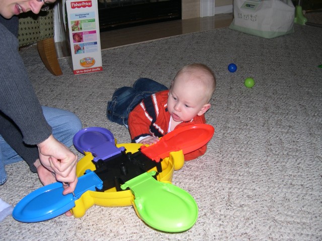 Nicky helping Daddy put together his new toy