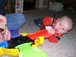 Nicky helping Daddy put together his new toy