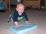 Nicky opening an Easter present from Aunt Carolyn