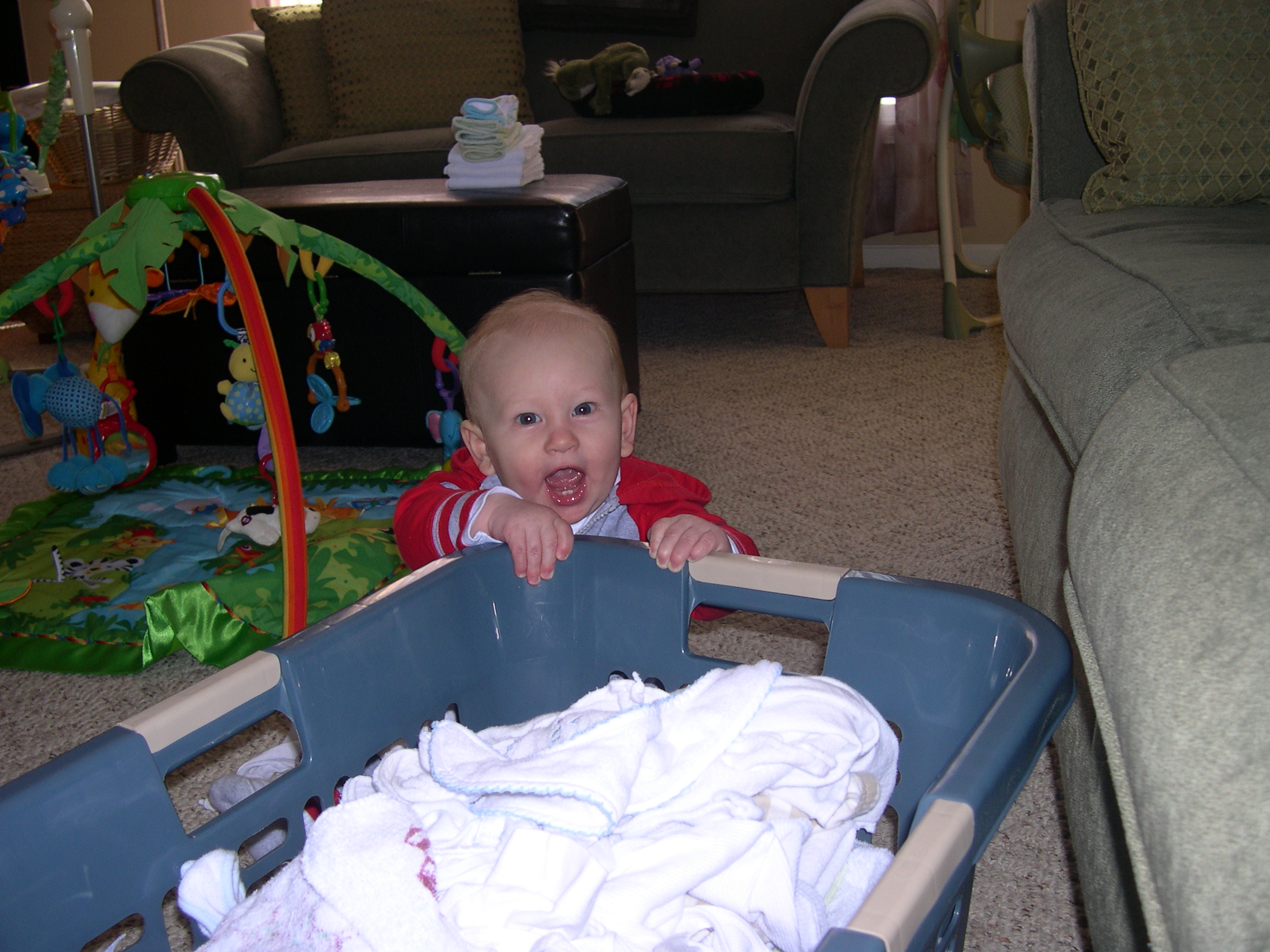 Nicky helping Mommy fold laundry