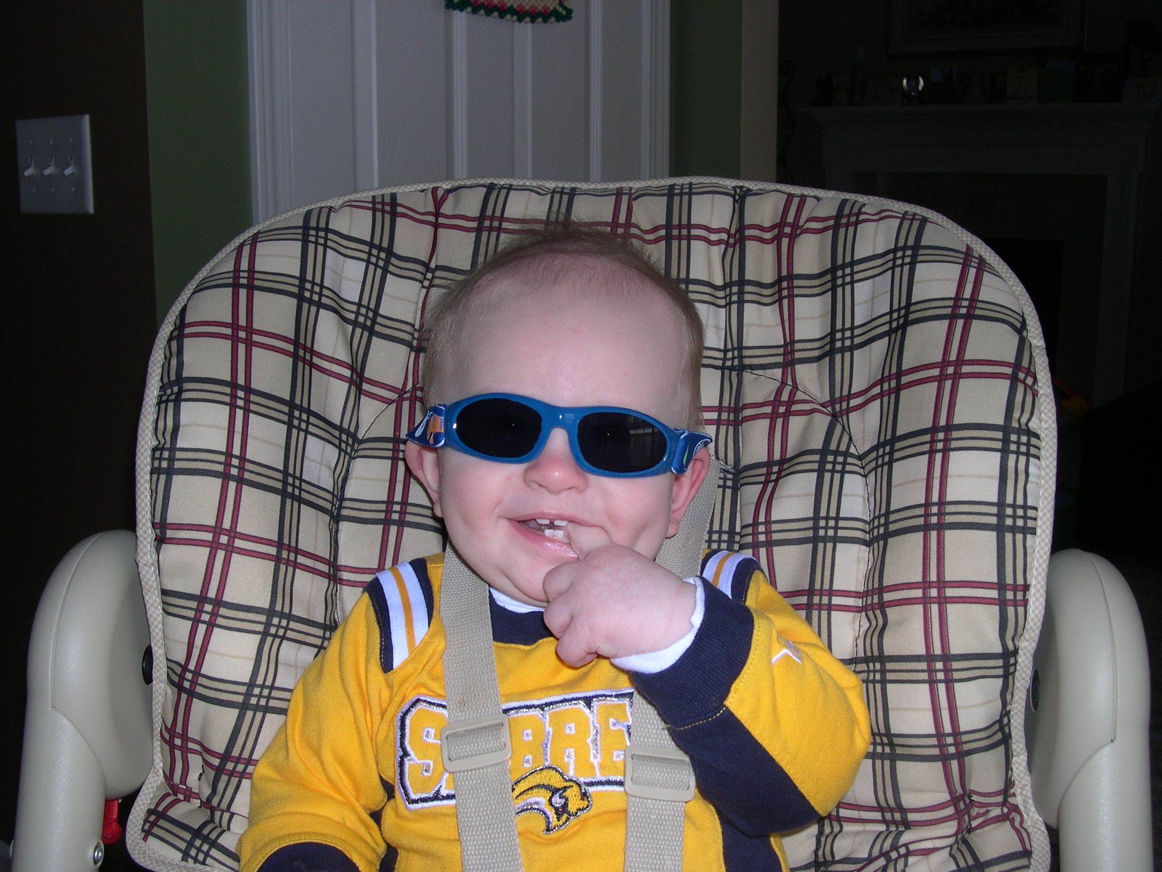 Trying on his new sunglasses