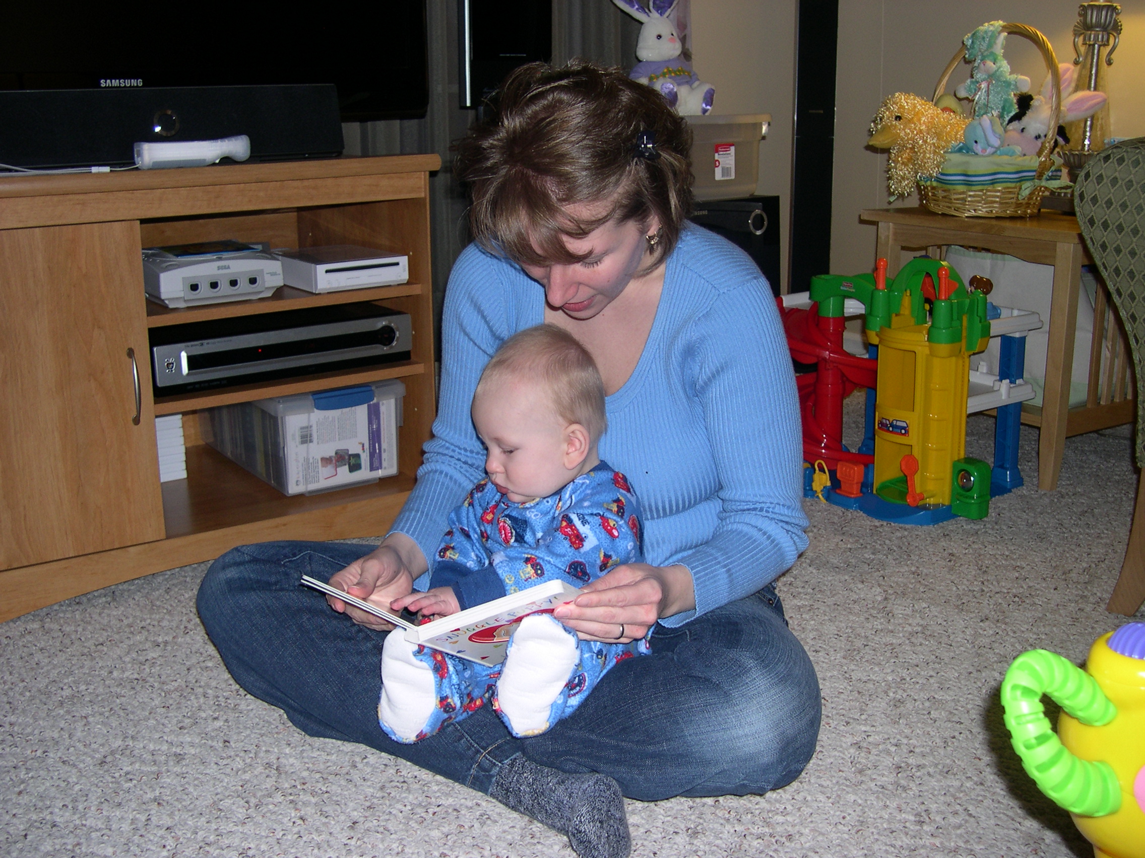 Mommy reading to Nicky