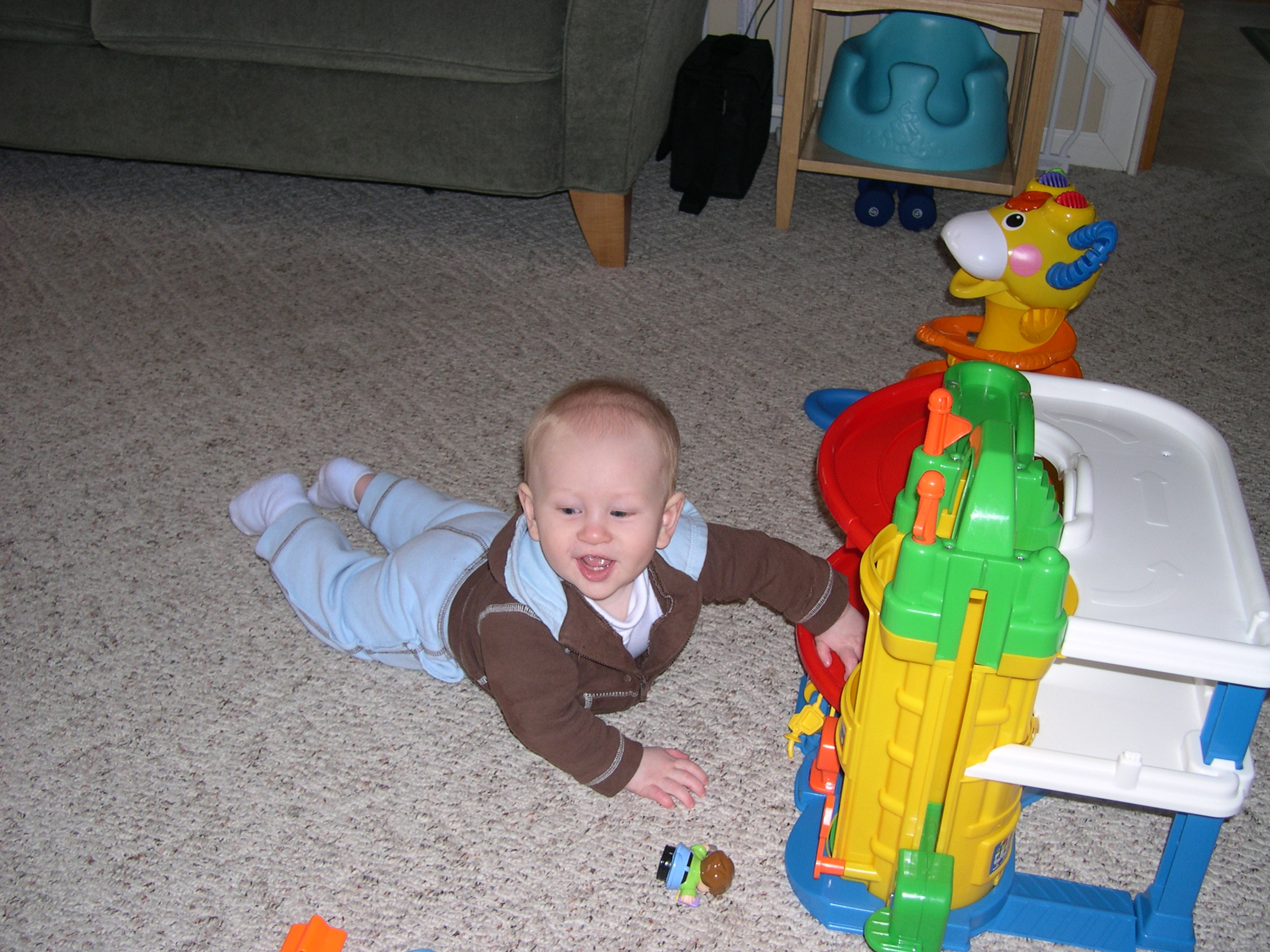 Too late, Mommy!  You missed me standing with the toy!