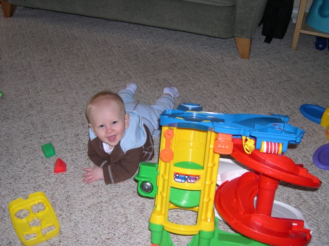 Nicky loves his toys!