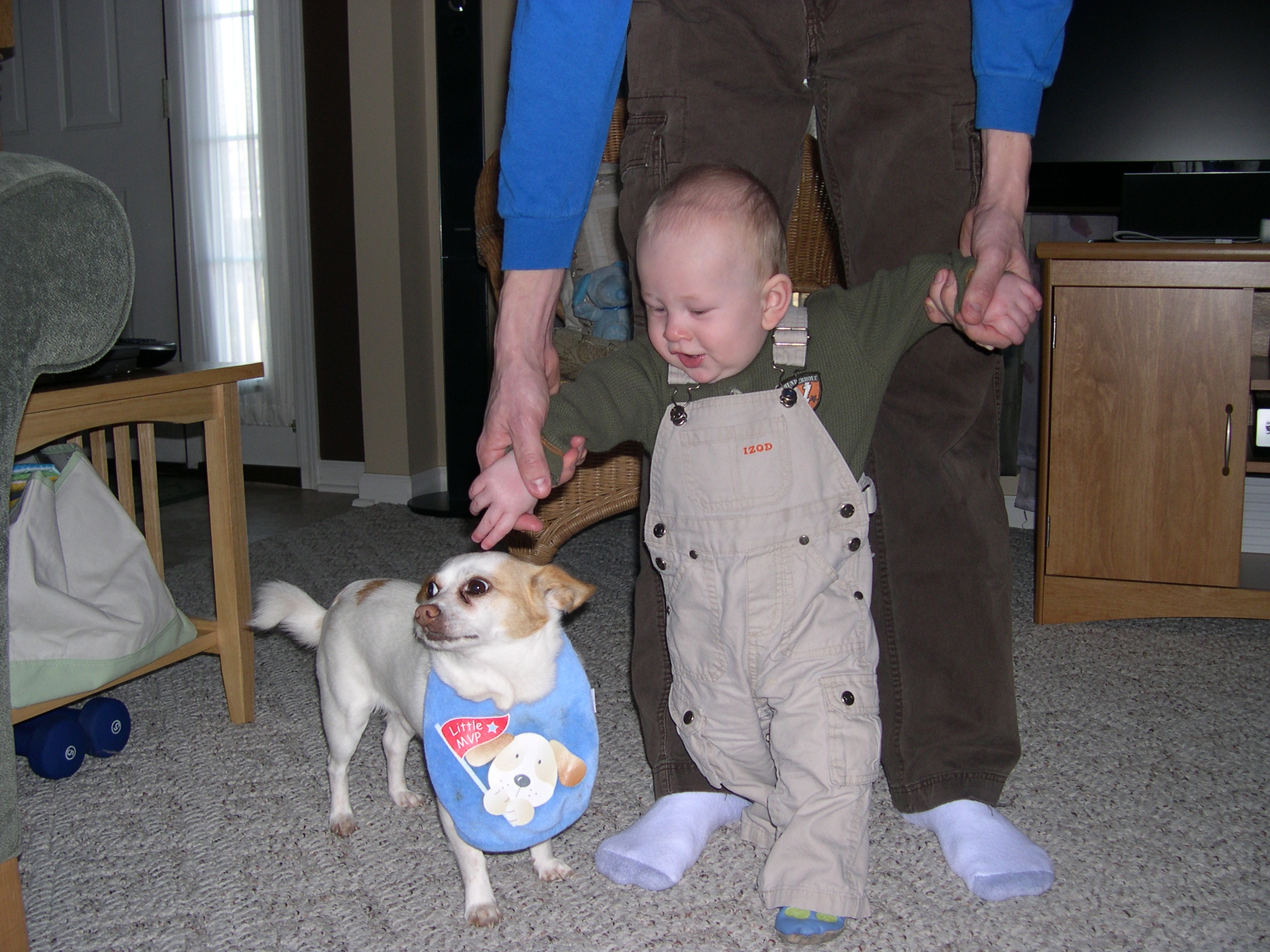 Nicky trying to take his bib off of Keanu