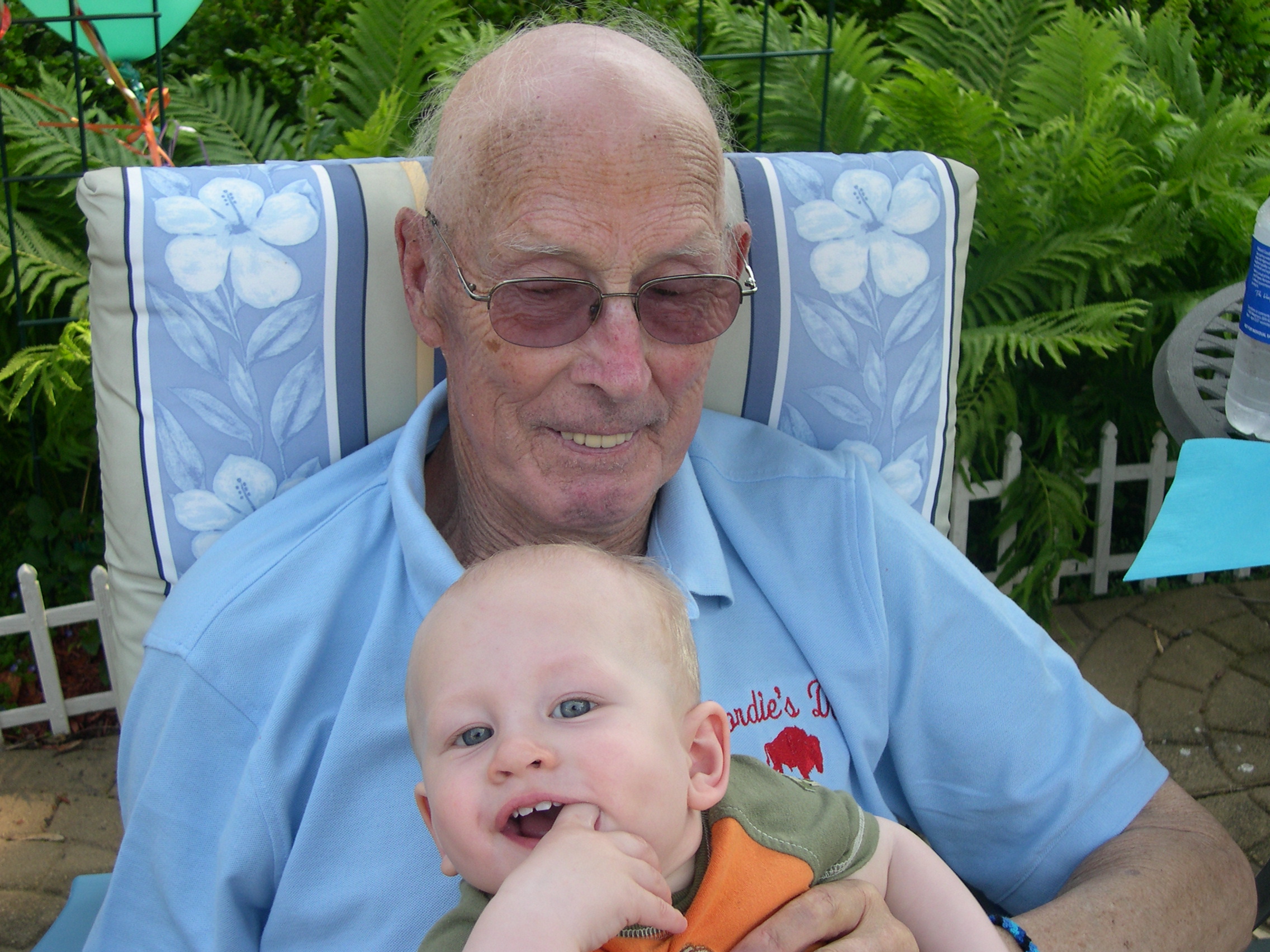 Nicky wiggling with Grandpa Gordy