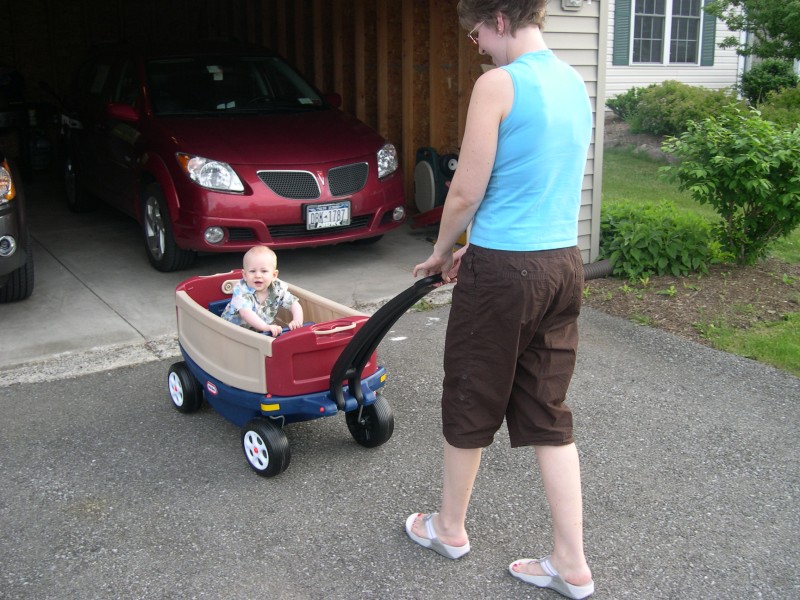 Mommy taking Nicky on his first wagon ride