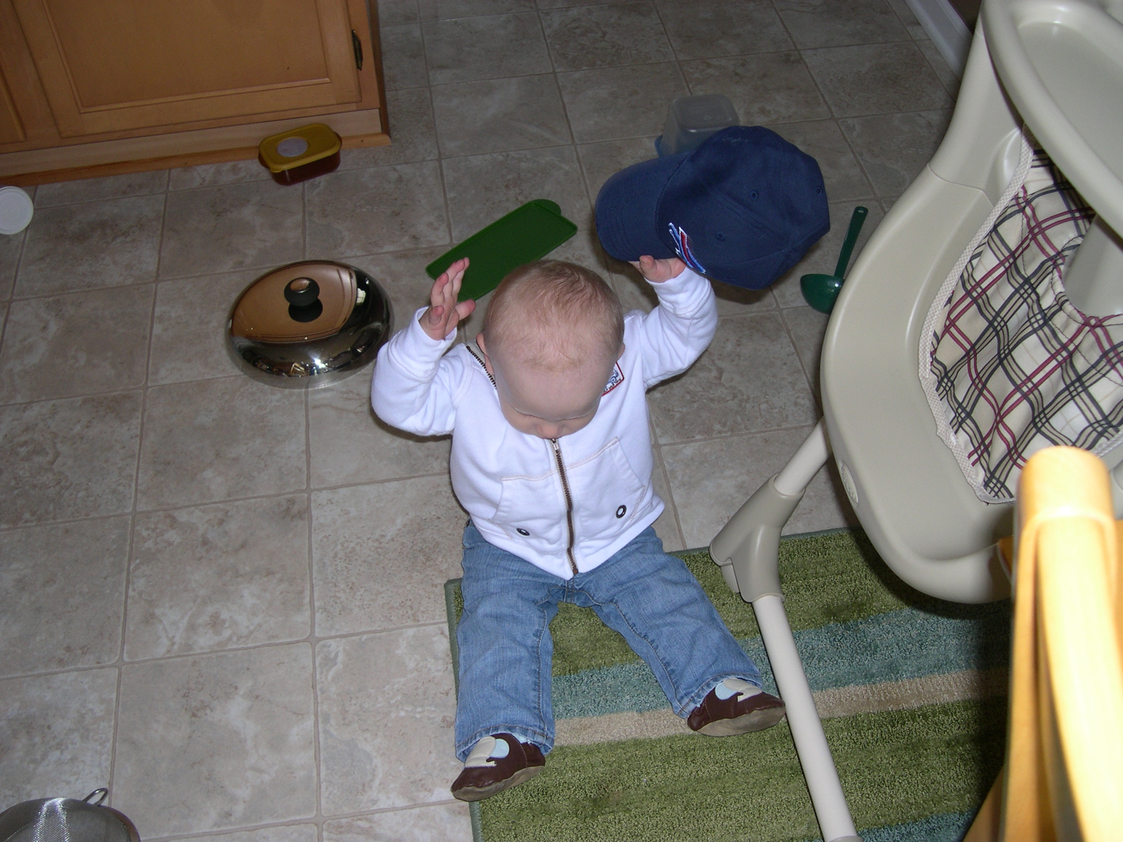 Nicky trying to put on his Bills hat