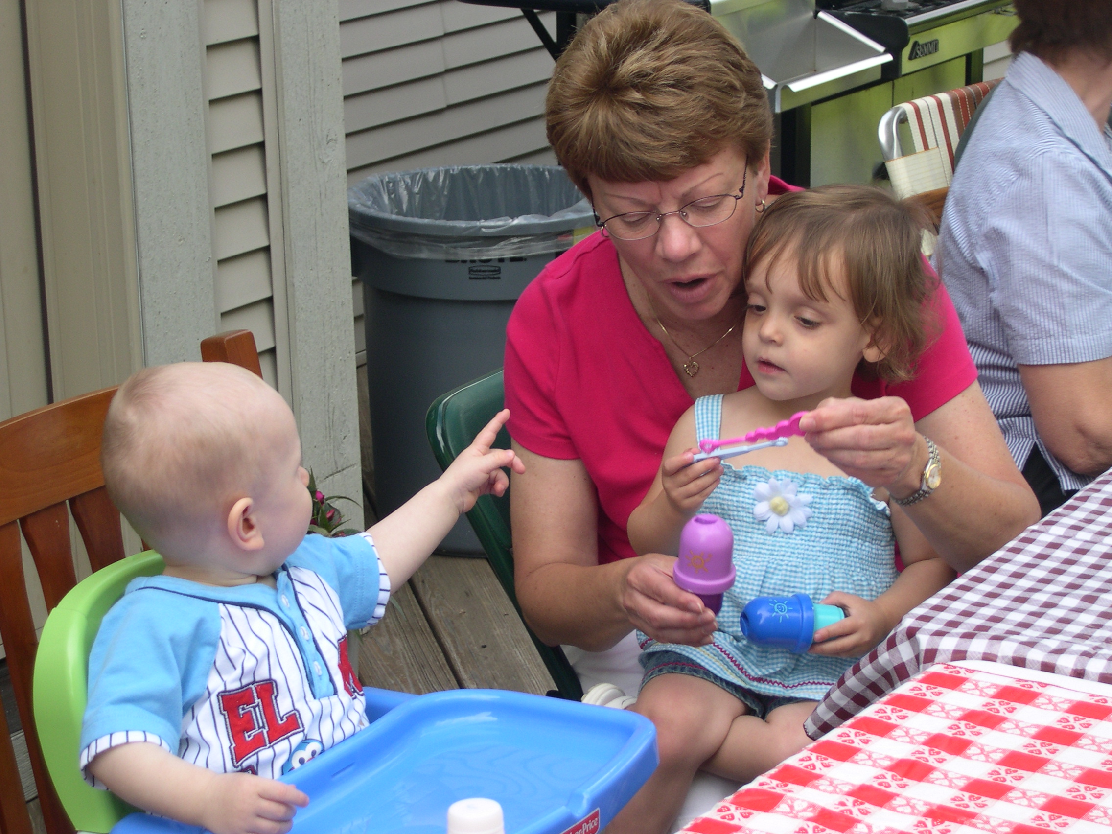 Blowing bubbles with Ella (Nicky's 3rd cousin) and Great-Aunt Carolyn