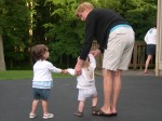 Ella and Nicky holding hands