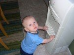 Nicky likes the tray on the water cooler