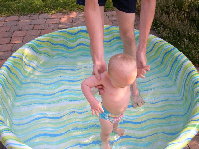 Nicky walking around the pool