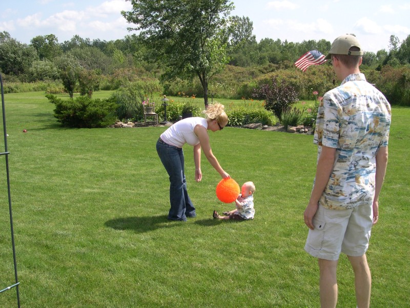 Aunt Jessica and Nicky playing while Daddy watches