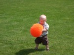 Nicky loves his big koosh ball from Great Grandma Nancy!