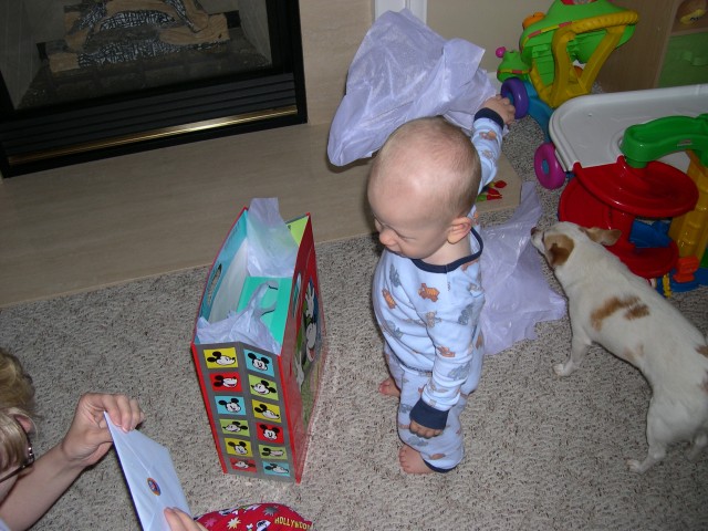 Nicky opens his present from Grandma Karen and Grandpa Ken