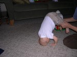 Practicing a somersault with Daddy