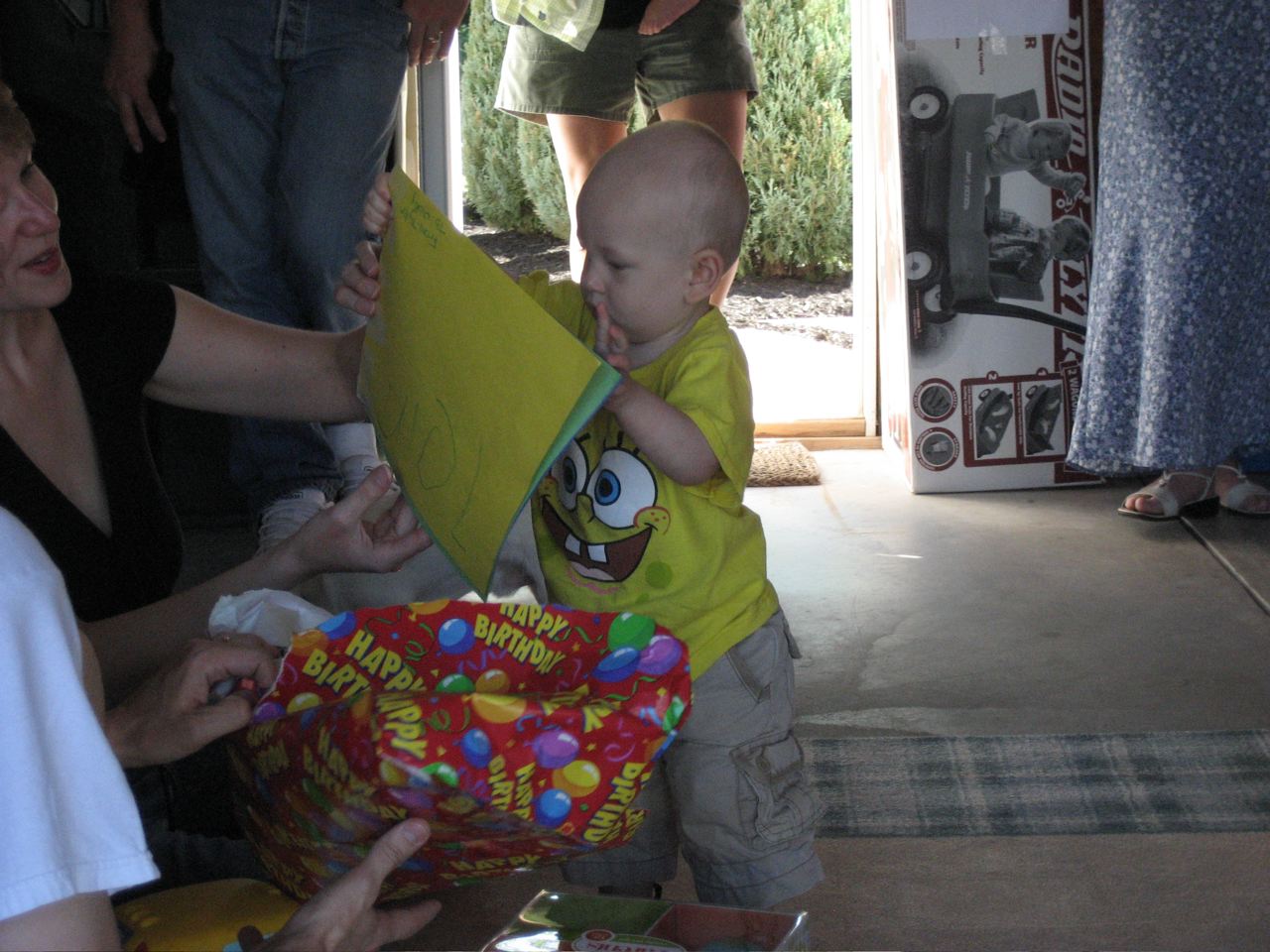 Nicky opening the book that Tyler made for him