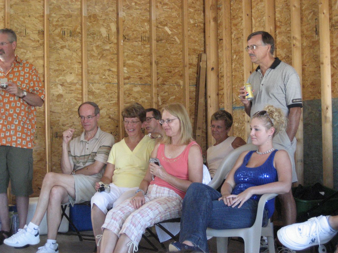 Everyone watching Nicky open his presents