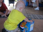 Nicky checking out his present from Grandpa Mike and Grandma Chris