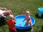 Nicky and Rylie swimming in Rylie's pool