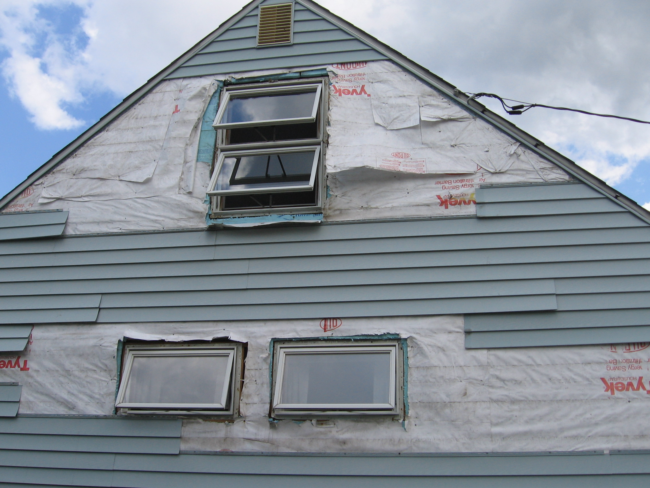 Bedroom side of the house with siding removed