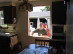 Dan and Dad inspecting the hole where the kitchen window was taken out