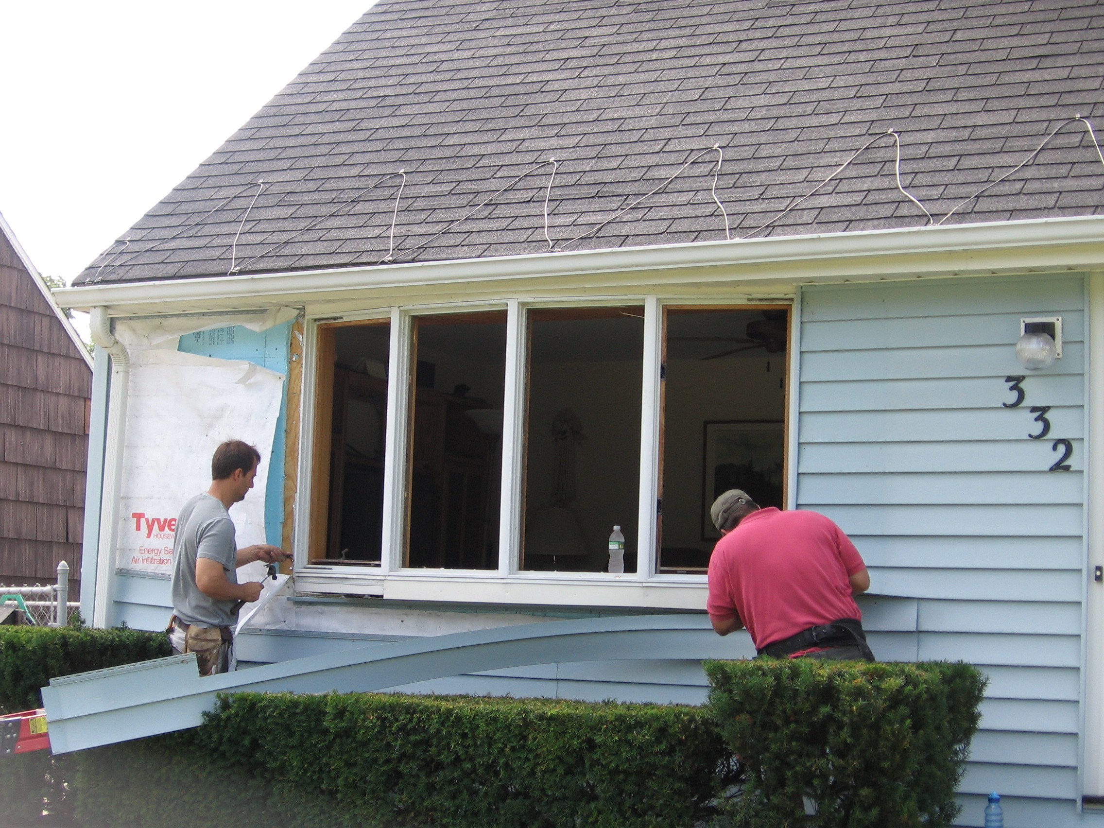 Removing siding to get old window out