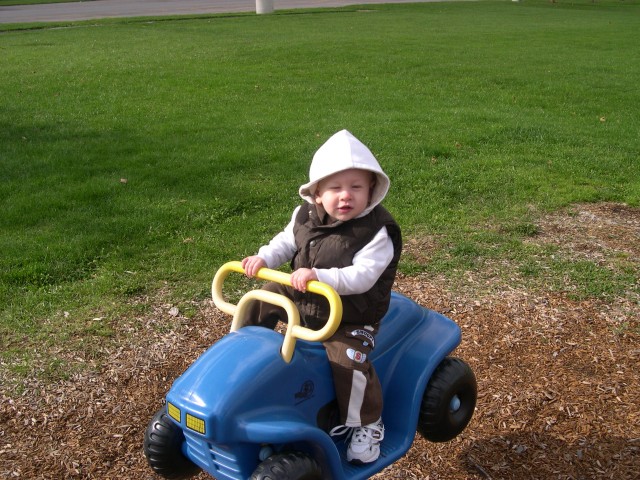 Nicky on the car at the farm