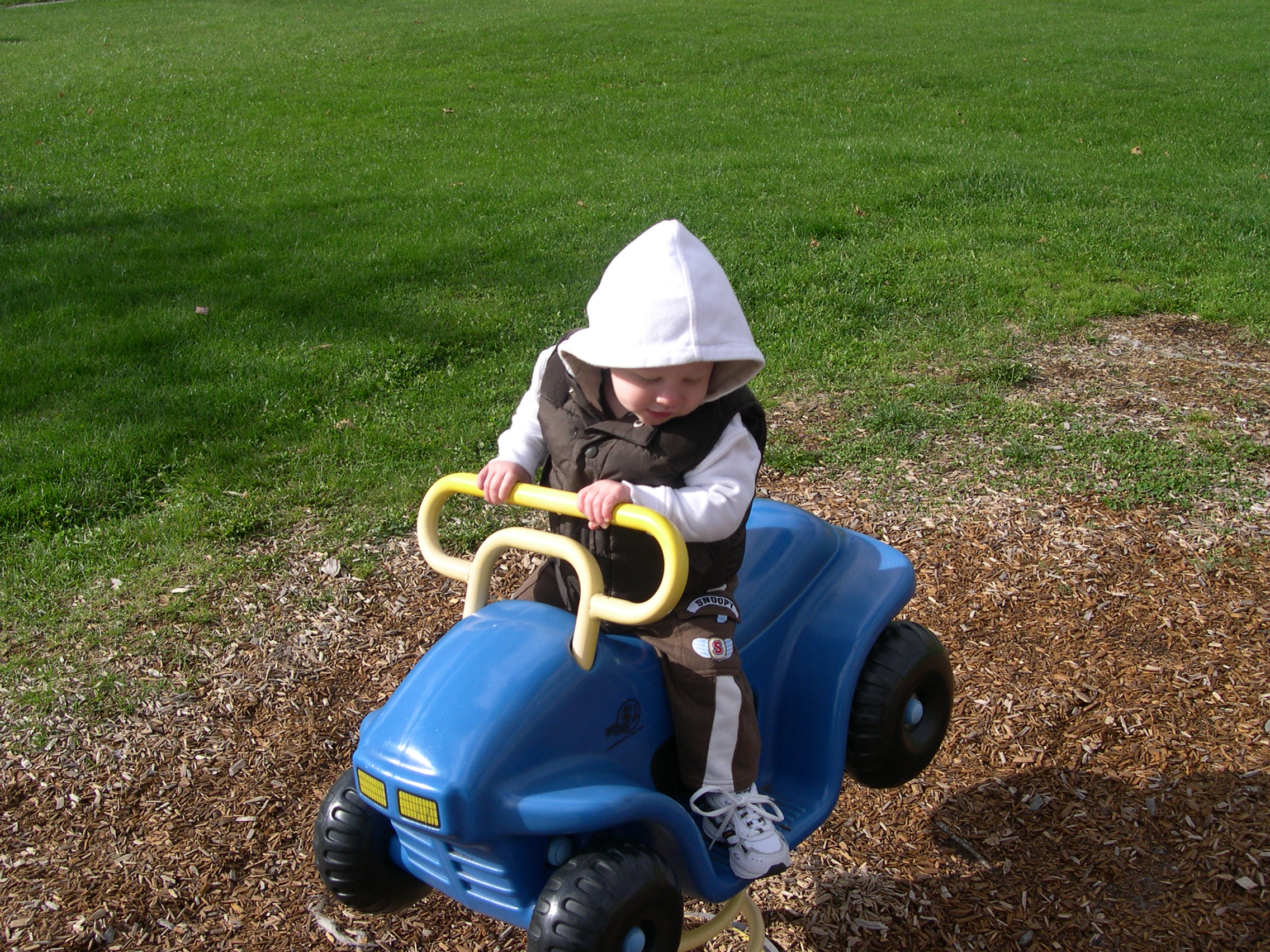 Checking out his sweet ride