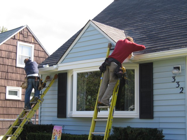 Another picture of the gutters going up.