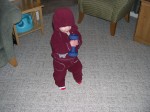 Nicky is strong!  (That's a 5-pound weight!)
