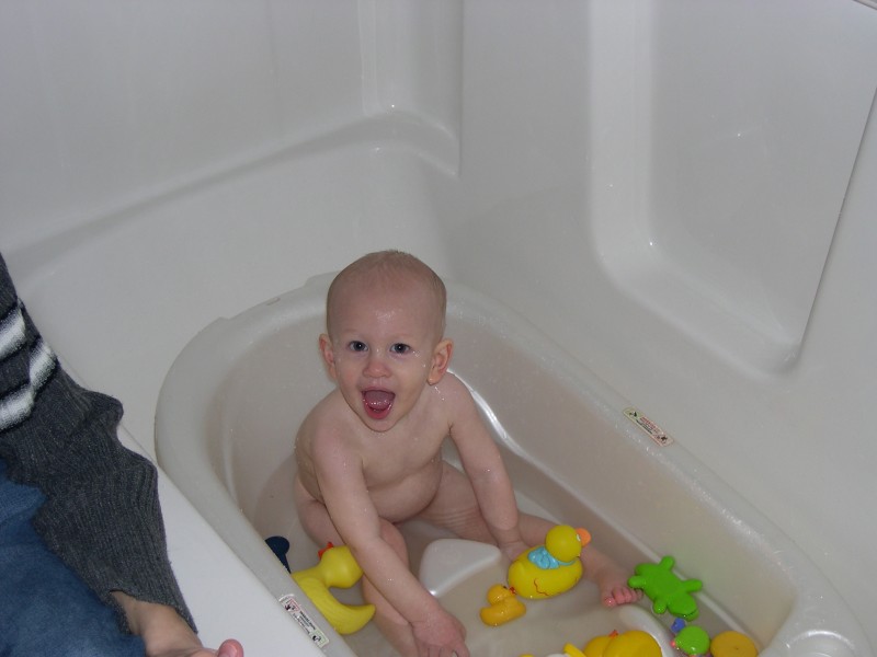 Nicky and the ducks in the tub