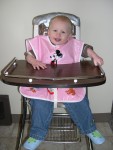 So cute in Daddy's old high chair!