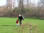 Dad leading Nick back to our property